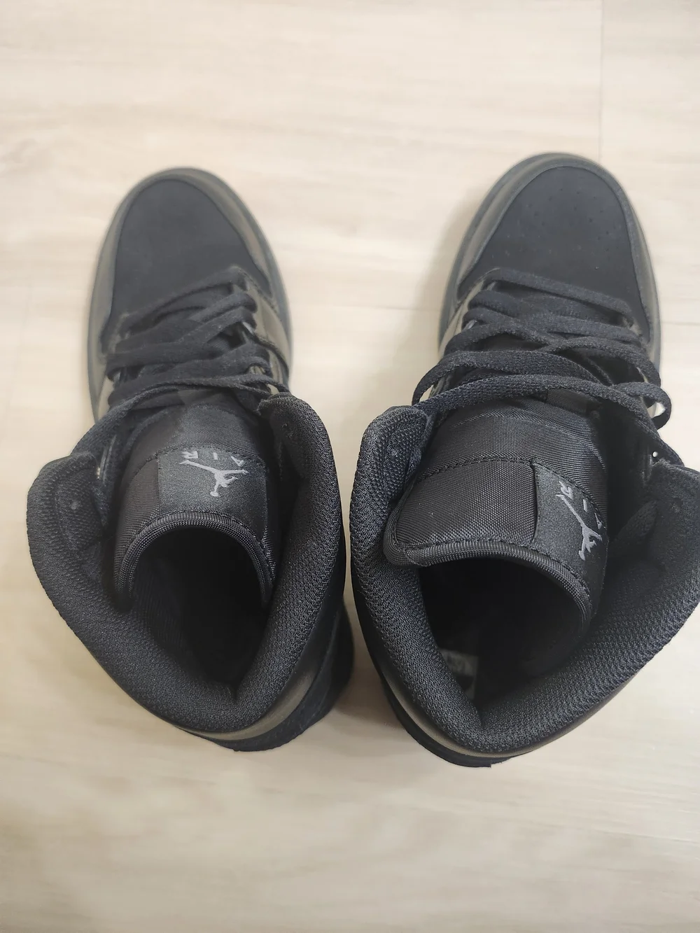 Jordan All-Black High Top Sneakers